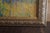 A 1930s landscape of trees which is framed in a "new" gold toned frame. The signature is obscured beneath the frame, and...