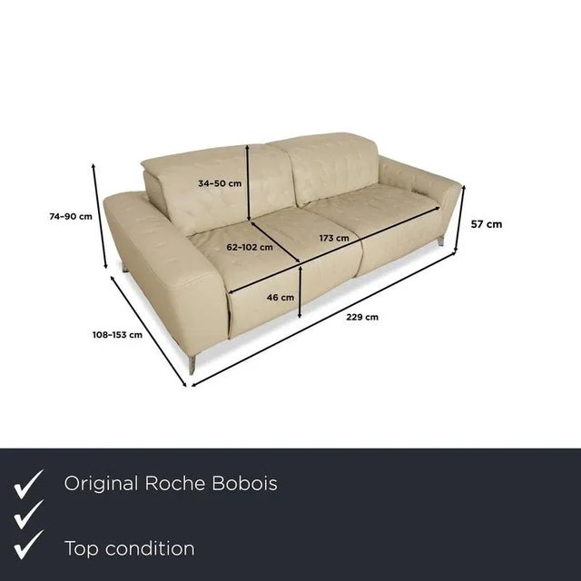 The Roche Bobois Satelite three-seater sofa brightens up any room with its creamy white color, creating a modern yet...