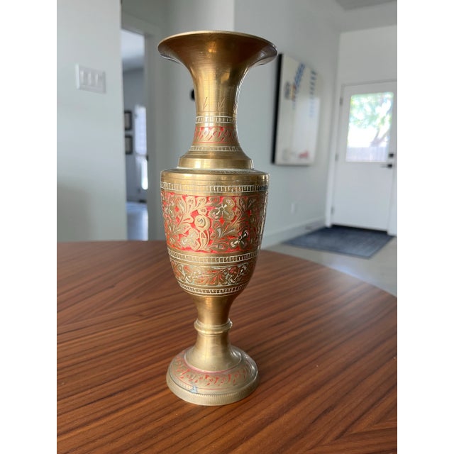 The beautiful, vintage, brass vase with its engraved floral design, and red detail, is a gorgeous South Asian, boho,...