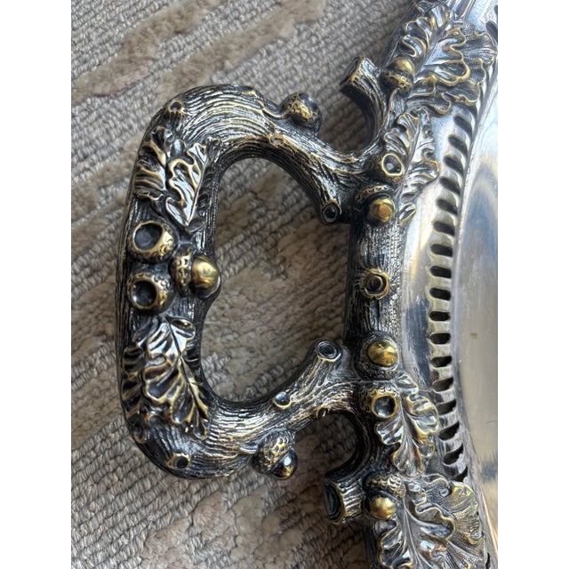 A monumental Silver Plate Victorian or Edwardian etiolated Tray, marked Jc and Company, England, the central oval chased...