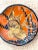 Vintage glazed terracotta vide poche. Made in Italy. Umber orange with blue coral and fish.