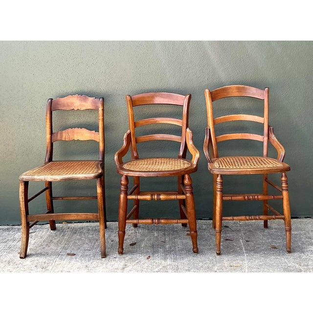 This curated trio of vintage chairs offers a charming "collected" aesthetic, perfect for adding texture and history to a...