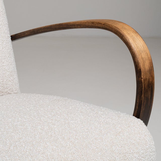 Pair of bentwood-arm lounge chairs in Warm Ivory Linen. Finished in warm ivory linen, this pair of bentwood-arm lounge...