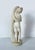 A distinctive late 19th-century alabaster sculpture depicting venus callipygia, or aphrodite with the "beautiful...
