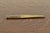 A gorgeous Arts & Crafts period brass finished hand hammered copper letter opener By Roycroft (signed with impressed orb...