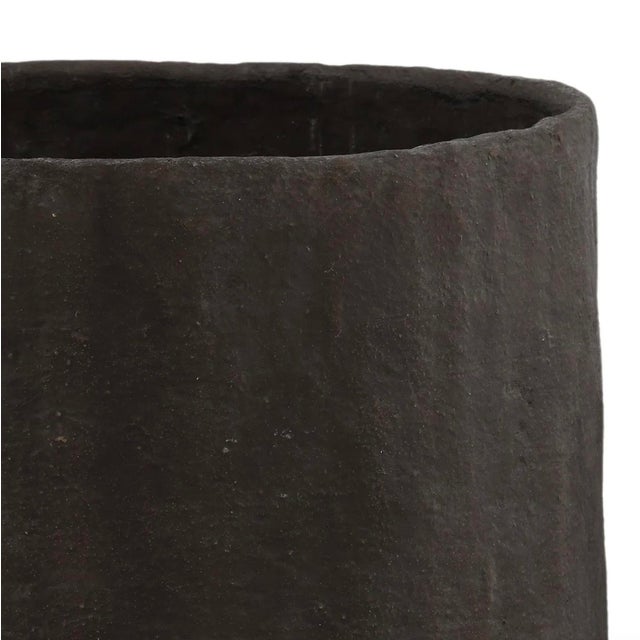 Crafted from reinforced composite concrete material and perfect for outdoor use, this planter brings an organic,...