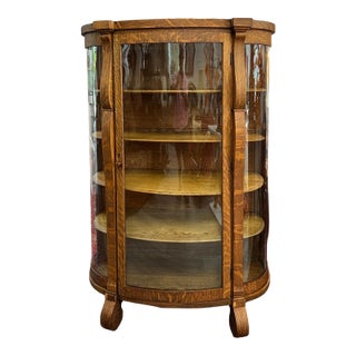 Antique American Tiger Oak Bowfront Curio Cabinet With Bent Glass, C. 1900 For Sale