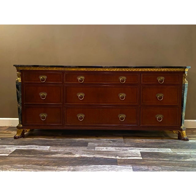 Glorious faux marble top multi drawer dresser by Widdicomb. Elaborate pulls and carvings. Spacious drawers. In good used...