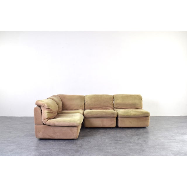 This modular sofa in green-beige color was manufactured in Germany in the 1970s by Rolf Benz. The sofa is in good,...