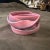 This vintage 21st-century pink and gray rubber bangle bracelet is a distinctive piece designed by Gaetano Pesce for Corsi...