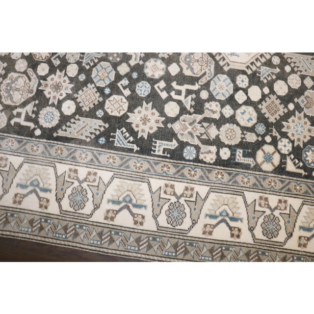 A mid-20th-century Persian Geometric rug in neutral colors