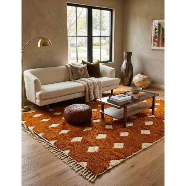 Mustard Moroccan Rug – Handmade Diamond Berber Wool Rug This beautiful handmade Moroccan rug features a warm mustard brown...