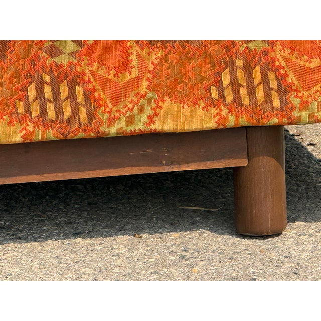 Striking vintage Mid-Century Modern pit loveseat by Selig of Monroe, retaining its original maker’s label. The loveseat...