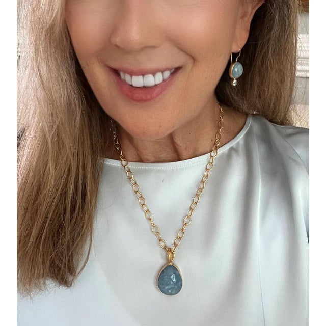 This all natural enhancer is handcrafted with Aquamarine. Enhancer has opening bail. Enhancer only