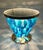 Modern Italian illuminated table with infinity lit mirror, dressed with blue and aquamarine Murano glass leaves mounted on...