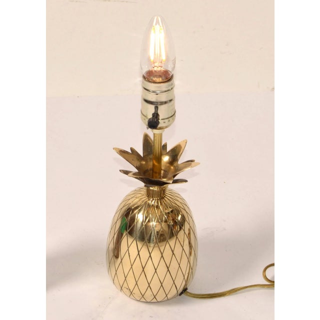 Small Hollywood Regency sculptural polished bronze pineapple table lamp or Bedside Table Light. Has a felt cover to the...