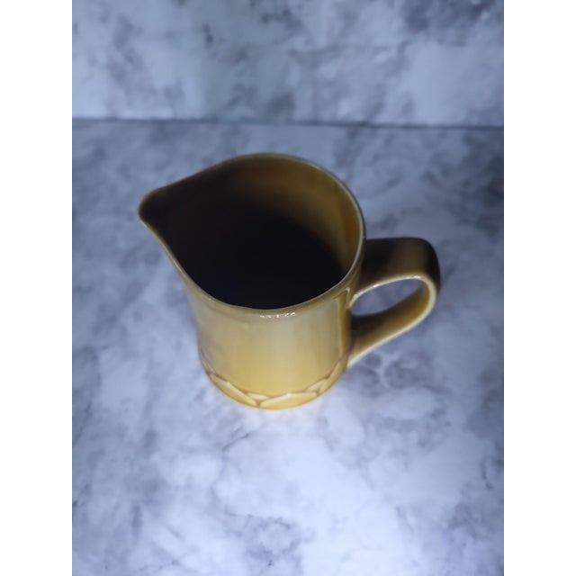 Beautiful mid century golden seville creamer. Excellent condition with petal details at the bottom.