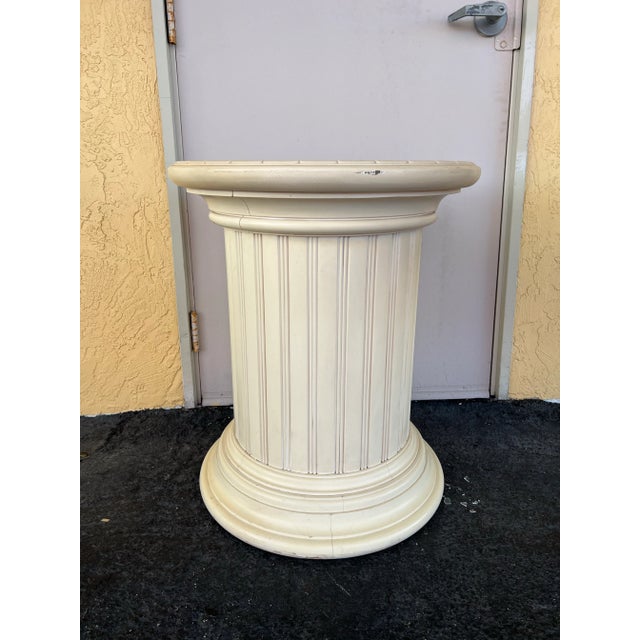Heavy Wood Column Pedestal with a Doric Style. Cream in color with a detailed top. I have 2 of these selling separately....