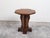 An Italian walnut side table from the 19th century, with octagonal top and pedestal base. Created in Italy during the 19th...