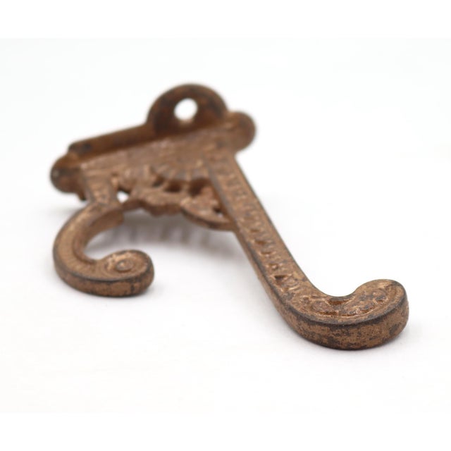 Early 20th Century Antique Eastlake Distressed Cast Iron Wall Hook For Sale - Image 5 of 6