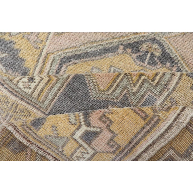 Vintage Oushak Rug From Turkey With Medallion Design in Yellow, Pink, Grey Blue For Sale - Image 9 of 10