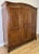 This elegant Vintage French Louis wardrobe showcases refined craftsmanship with beautifully shaped panel doors, graceful...