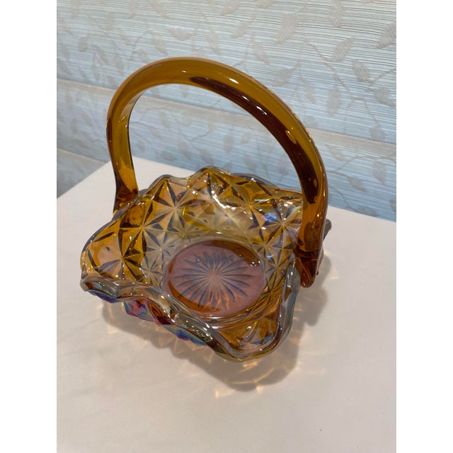 A highly collectible piece that appeals to both carnival glass enthusiasts and vintage Easter decor collectors. This...