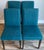Modern Channel Tufted Upholstered Fabric Dining Side Chair in teal, showcasing a distinct vertical channel-tufted backrest..