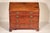 George II mahogany slant top desk, circa 1800. With a rectangular top, a nicely figured mahogany slant lid, the interior...