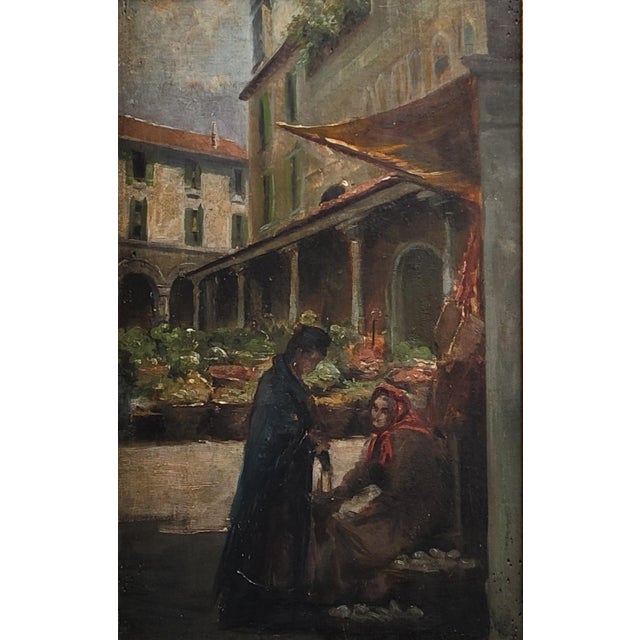 A beautiful and skillfully painted antique early 1900s oil paint on wood panel of a Venetian market scene. Signed in the...