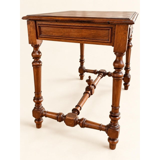 Magnificent louis xiii style solid walnut writing desk, dating from the 19th century. its four turned baluster legs with...