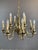 Elegant Bronze Chandelier, Early 20th Century This magnificent bronze chandelier is a tribute to classic craftsmanship and...
