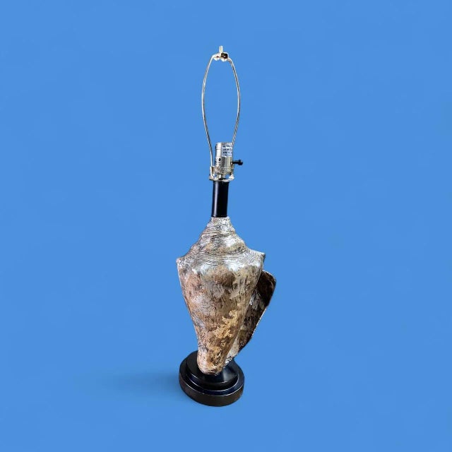 Pair of vintage coastal metallic conch, shell table lamps no shades lamps are designed to resemble large conch shells...