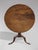 A handsome late 18th-century George III period mahogany tripod table. It features a well-figured single piece of solid...