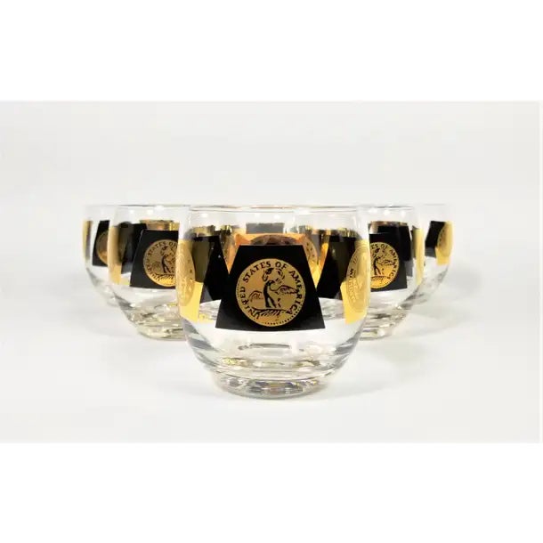 Mid Century 1960s Currency Collection by Cera 22-karat Gold and Black Cocktails Glasses Glassware Barware. Shape often...