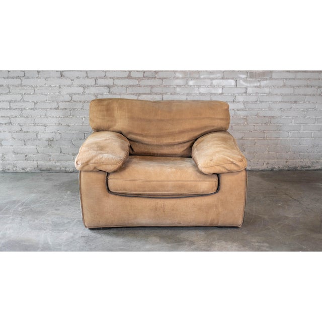 Roche Bobois for Tre Erre S.p.A. buffalo leather club chair in a camel-tan color, circa 2001. Ultra comfort, heavy padded...