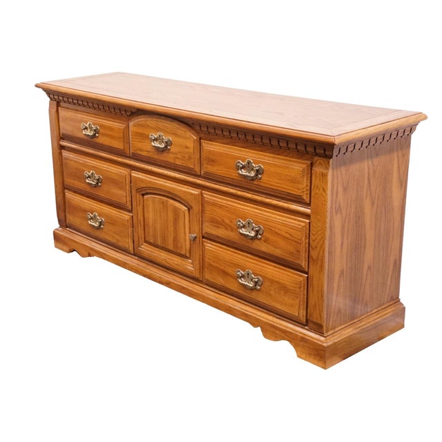 BASSETT FURNITURE Solid Oak Early American Country Style 68" Triple Door Dresser 2283-247 33" High 68" Wide 19.5" Deep We...