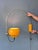A classic arc wall lamp with yellow eyeball shade from the Dutch brand Herda. The shade can be turned in any direction...