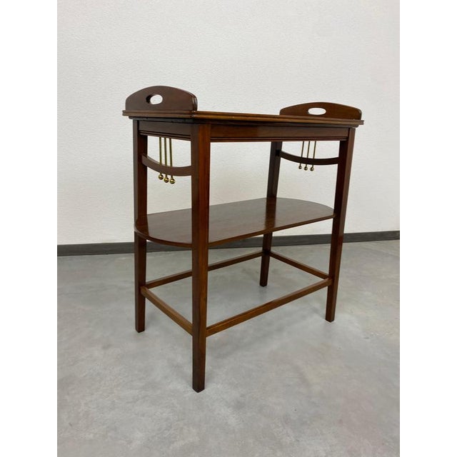 Jugendstil side table professionally stained and repolished.