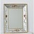 A dazzling French vintage mirror of églomisé design in the border panels featuring stylized herons and mythical phoenix...