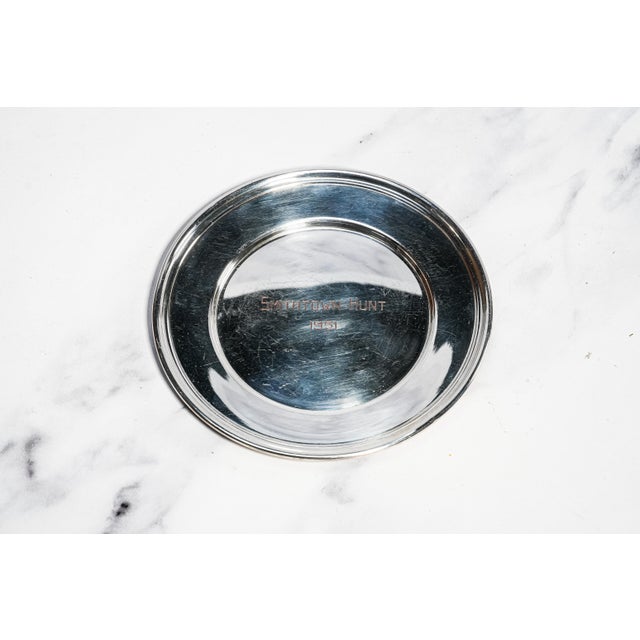 A charming piece of sporting history, this vintage silverplate trophy dish commemorates the Smithtown Hunt, elegantly...