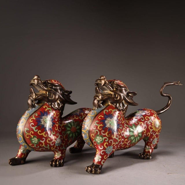 This is a matched pair of antique cloisonné enamel sculptures depicting Pixiu, mythical creatures revered in traditional...