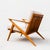 A rare and coveted teak “Z” lounge chair by Poul Jensen from the early 1960s, fully refinished and reupholstered in a...