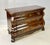 A beautiful vintage French Provincial style bombé chest or commode produced by Henredon Furniture Industries in Morganton,...