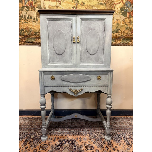 1930s William & Mary style cabinet by Radio Art Cabinets, USA. This beautiful vintage piece features classic period...
