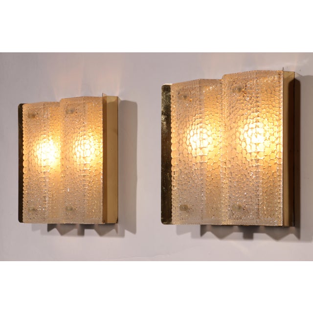 These stunning wall lamps, crafted by Falkenbergs Belysning in the 1960s, bring timeless Scandinavian design into any...