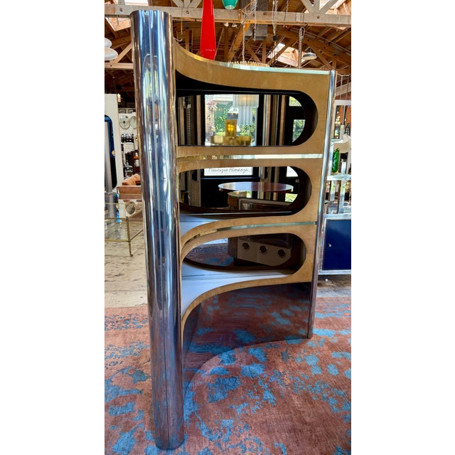 Rare 1970s Willy Rizzo bar cabinet featuring the designer’s signature glamorous modernist aesthetic with polished chrome,...