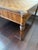Elevate your living room or library with this classic French Neoclassical style square game coffee table. Featuring an...