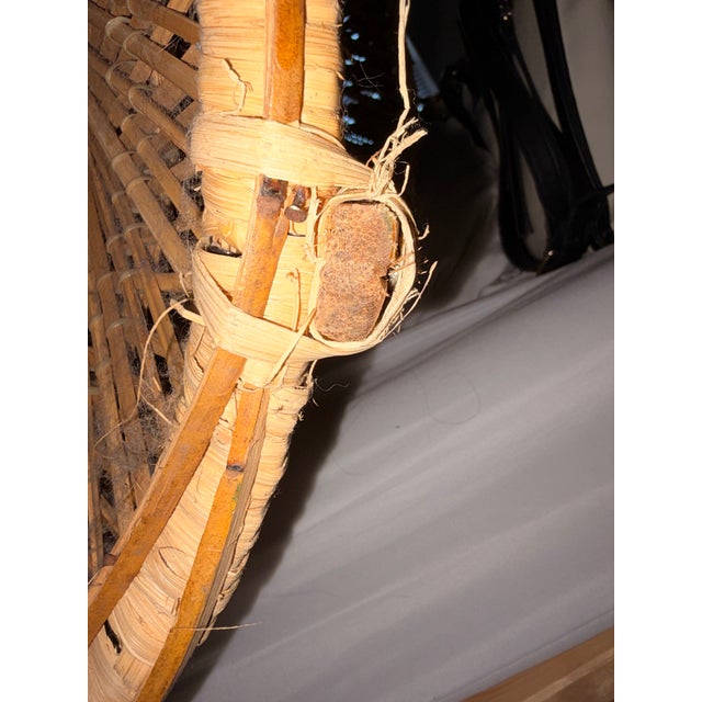 70s vintage natural rattan peacock chair. Hourglass base and black accent weaving.Kept inside for the past 10 years that...