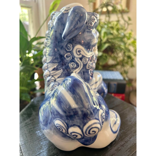Late 20th Century Vintage Chinese Chinoiserie Blue & White Porcelain Foo Dog Guardian Lion on Wood Stand For Sale - Image 5 of 12